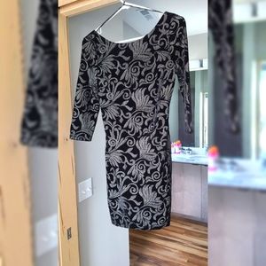 Never worn fit black dress.